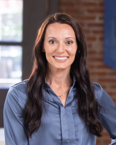 smiling person in business attire